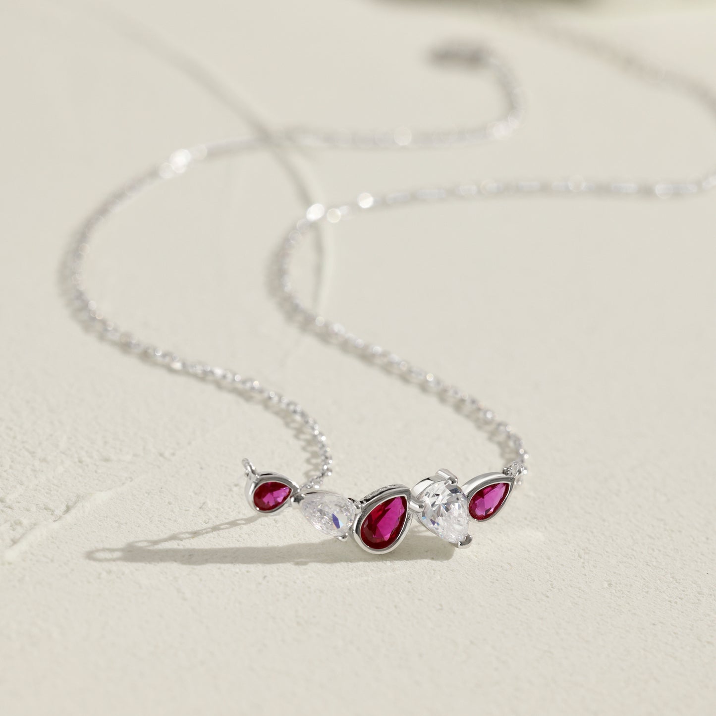 Sterling Silver Cluster Bar Necklace with Ruby Colored and CZ Stones